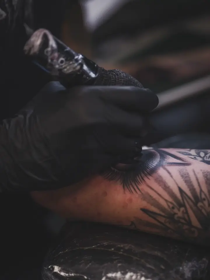 Fine line inner-arm tattoo by Bianca Ryan