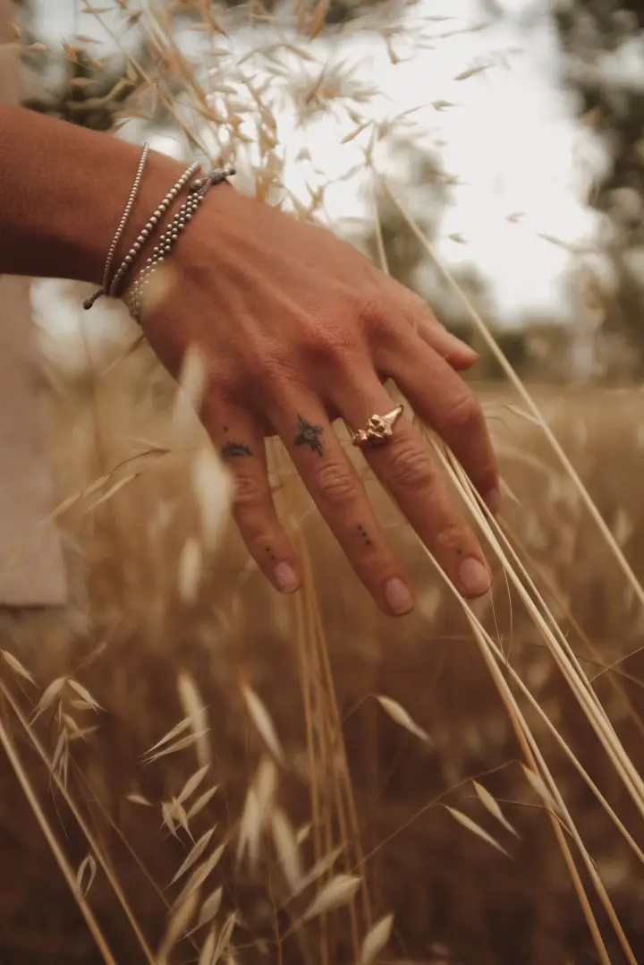 Fine line hand tattoo by Bianca Ryan