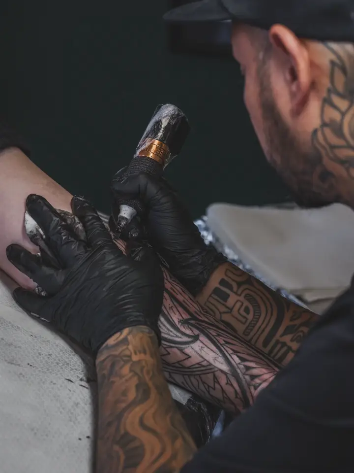 Fine line rib tattoo by Bianca Ryan